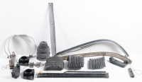 AUTOJUMBLE: A group of parts to suit 1974-85 Porsche 911, includes bumper accordions, two muffler straps, two rear torsion bar mounts, sway bar clamps, G series front bumper inserts