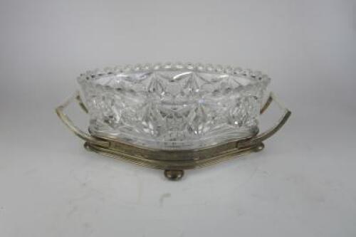 ART NOUVEAU: An Art Nouveau twin-handled silver and cut-glass centrepiece bowl