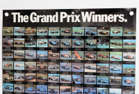 FORMULA 1: A large circa 1977 laminated poster 'The Grand Prix Winners' released by Borg & Beck Clutch / Lockheed Brakes featuring a picture of every Formula 1 Grand Prix winner from 1968 up to 1977, 92cm high, 74cm wide - 2