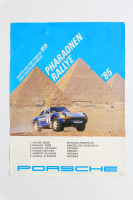 PORSCHE 959: A large 1985 dated Porsche poster celebrating the Porsche 959 victory at the 1985 Pharaonen Rallye event, 76cm high, 1.01m wide