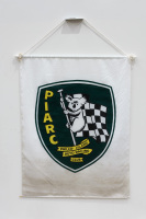 PHILLIP ISLAND: A large cloth Phillip Island Auto Racing Club (PIARC) banner, 1.25m high, 96cm wide