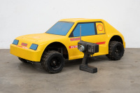 RADIO CONTROLLED: A large radio controlled model car with removable fibreglass body, in Shell Oil livery, has motor, suspension etc, 90cm long, 55cm wide