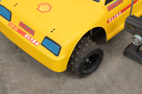 RADIO CONTROLLED: A large radio controlled model car with removable fibreglass body, in Shell Oil livery, has motor, suspension etc, 90cm long, 55cm wide - 2