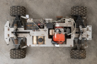 RADIO CONTROLLED: A large radio controlled model car with removable fibreglass body, in Shell Oil livery, has motor, suspension etc, 90cm long, 55cm wide - 5