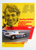 PORSCHE 956: A large 1984 dated Porsche poster celebrating the Rothmans Porsche 956 winning the 1984 world Sportscar championship with photo portrait of Stefan Bellof, 1.01m high, 76cm wide