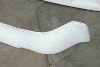 PORSCHE PANELS: Two Porsche 911 fibreglass panels, includes a left side front slant nose mudguard and a lower front bumper apron - 2