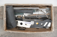 INTERIOR TRIM: A box of assorted interior trim pieces for dash inserts, for both left & right hand drive