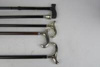 WALKING STICKS: Four traditional styled contemporary gentleman's walking sticks