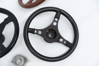 STEERING WHEELS: Three steering wheels leather bound, all have boss fitted, thought to suit 911 pre 1974 - 2