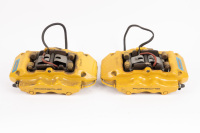 CALIPERS: Two Porsche Brembo rear brake calipers complete with pads to suit ceramic discs
