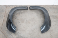 PORSCHE 911: A pair of new, unpainted circa 1976-86 Porsche 911 rear wheel arch flares, part numbers 91150360703GRV / 91150360803GRV
