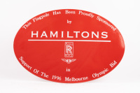 SIGN: An enamel oval shaped metal sign used by Hamilton Rolls-Royce / Bentley to promote their support for the Melbourne 1996 Olympic bid, 45cm high, 30cm wide