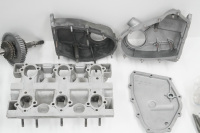 ENGINE PARTS: A group of assorted Porsche 911 circa 1969 engine parts, includes rocker covers, cam boxes and cam chain covers - 17
