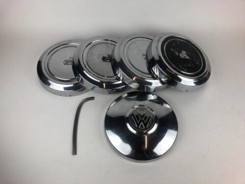 HOLDEN: Four original Holden Hub Caps H Series, a Holden "Eyebrow" and VW Hub Cap