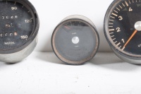 GAUGES: A set of Porsche 911 T circa 1967 gauges, includes oil temp, tacho, fuel gauge, speedo (partially dismantled) and clock - 6