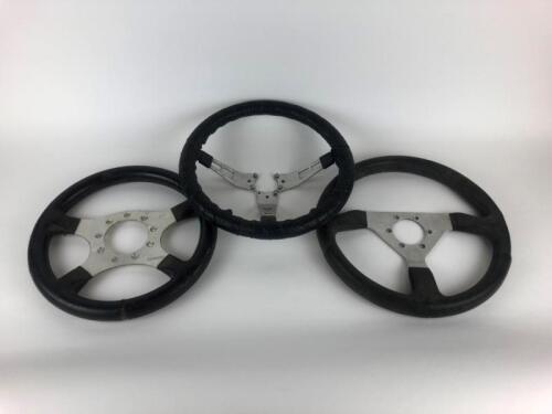 RACING: Three assorted steering wheels, good used condition