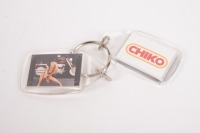 A pair of late 1990s - early 2000s Chiko Roll plastic keyrings featuring Sarah Jane on a Harley Davidson Fatboy