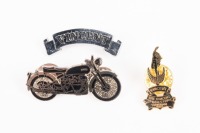Three pins/badges related to Vincent