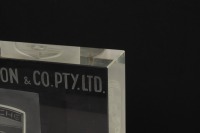 NORMAN HAMILTON: A high quality commemorative etched crystal block on cylindrical base celebrating 'Norman Hamilton & Co Pty. Ltd - 1950-1900' with etched Porsche emblem to centre, signed 'B. Hor&aacute;ček' 19cm high - 2