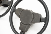 STEERING WHEELS: Two Porsche steering wheels, includes a circa 1977-83 Porsche 911 (crack in hornpad) and a modified Porsche 1977-83 steering wheel - 2
