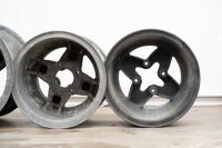RACING WHEELS: Six four-stud lightweight wheels, believed to be magnesium McLaren style, varying sizes and widths. - 4