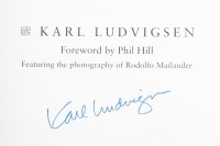 STIRLING MOSS: A hardcover edition of 'Stirling Moss - Racing with the Maestro' by Karl Ludvigsen with foreword by Phil Hill, signed by author to inside cover page - 2