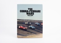 COBRA/FERRARI: A hardcover book titled 'The Cobra-Ferrari Wars - 1963-1965' Second Edition by Michael L. Shoen
