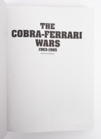 COBRA/FERRARI: A hardcover book titled 'The Cobra-Ferrari Wars - 1963-1965' Second Edition by Michael L. Shoen - 2