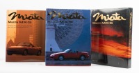MAZDA: A set of two 'Miata - Mazda MX-5' hardcover books by Jack K. Yamaguchi and Jonathan Thompson, held within slip case