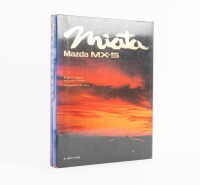 MAZDA: A set of two 'Miata - Mazda MX-5' hardcover books by Jack K. Yamaguchi and Jonathan Thompson, held within slip case - 2