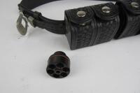 FIREARMS: A collection of black cross woven leather belts and holsters - 5
