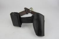 FIREARMS: A collection of black cross woven leather belts and holsters - 6