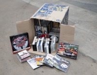 DVDS, CDS: A large group lot of DVDs and CDs, mostly relating to motor racing