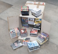 DVDS, CDS: A large group lot of DVDs and CDs, mostly relating to motor racing