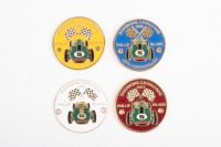 SHANNONS CAVALCADE: Four circular Shannons Cavalcade at Phillip Island event grille badges