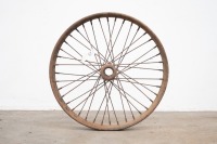 A circa 1920s Harley-Davidson front hub assembly, modified and welded one side, rim 21" diameter,&nbsp;rim is poor condition