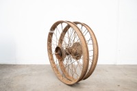 A circa 1920s pair of 23" wheels, believed English or Australian, front with bearings and axle