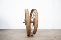 A circa 1920s pair of 23" wheels, believed English or Australian, front with bearings and axle - 2