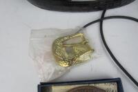FIREARMS: A collection of ornate black leather belts and holsters with applied medallions - 4