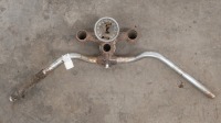 A handlebar, and top triple clamp with affixed 120 MPH speed, believed Royal Enfield