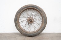A circa late 1940s/early 1950s Norton 19" wheel, turns