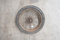 A circa late 1940s/early 1950s Norton 19" wheel, turns - 3
