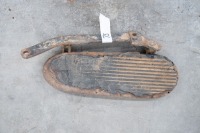 An Indian running board foot rest