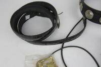 FIREARMS: A collection of ornate black leather belts and holsters with applied medallions - 5