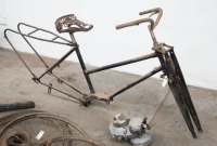 A collection of Autocycle parts including frame, forks, wheels - 5