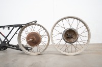 A motorcycle frame and two alloy rims believed to be CZ - 3