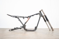A motorcycle frame and two alloy rims believed to be CZ - 5