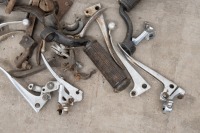 A collection of miscellaneous levers and foot pegs - 2