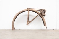 A circa 1920s rear mudguard with luggage rack, tool box and stand clip