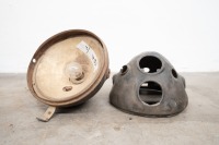 Two 7" headlamp surround, one believed Miller (stamped M40/CSL) and the Lucas (stamped 8U42)